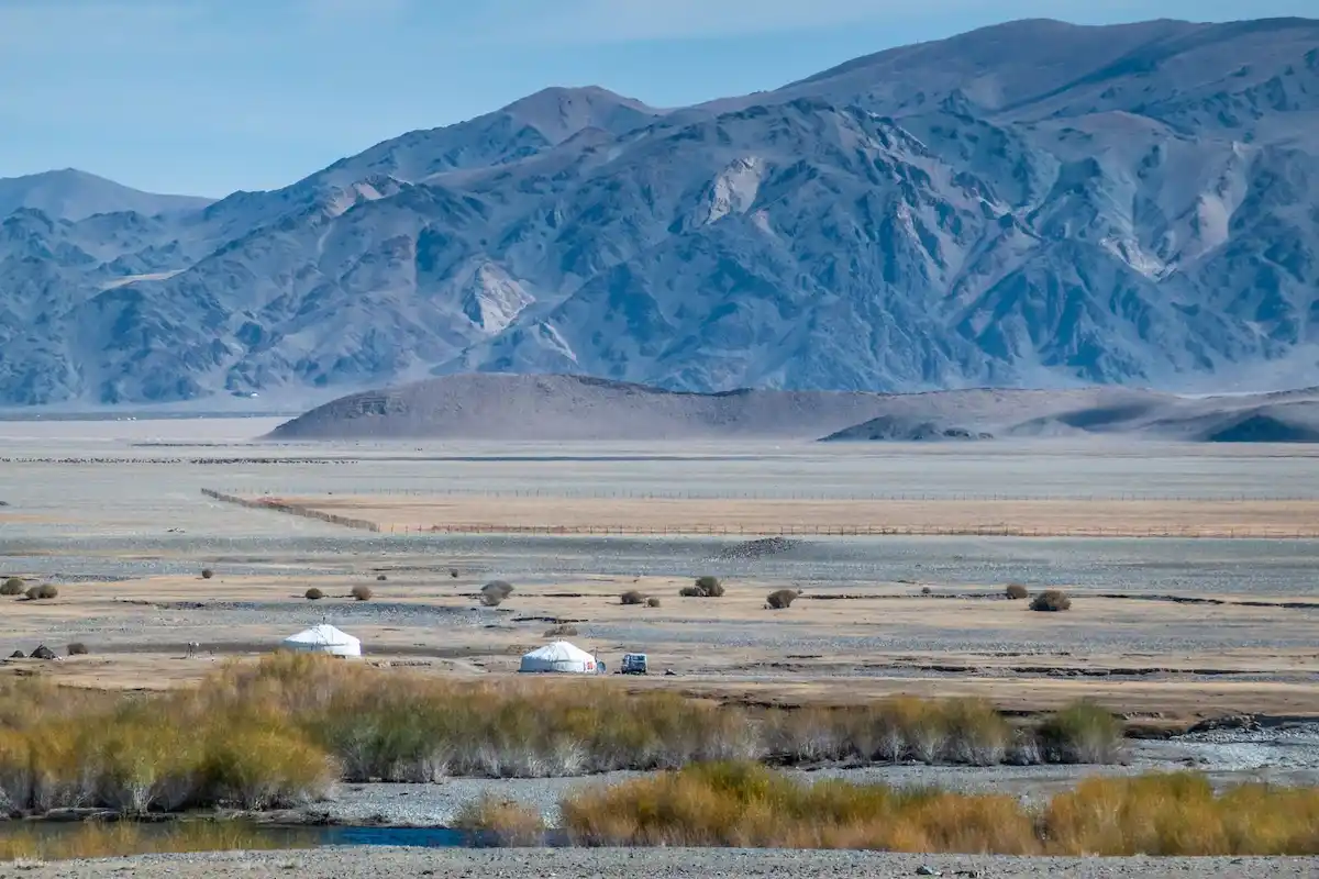 A landscape photo of the Mongolian steppe or Ulaanbaatar city skyline, representing the open-door policy for international tourists visiting Mongolia in 2026.