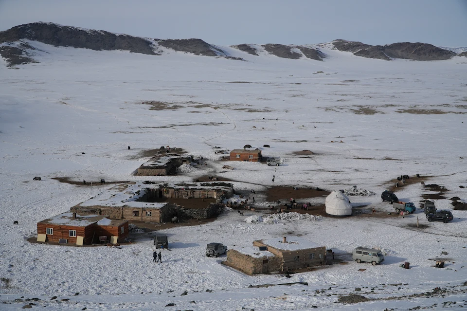 A spring pasture in western Mongolia — blending tradition and modern life in the snowy Altai