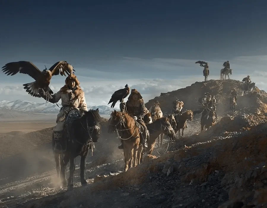 Eagle hunters gallop across the Altai Mountains—an iconic moment from Mongolia’s Golden Eagle Festival.