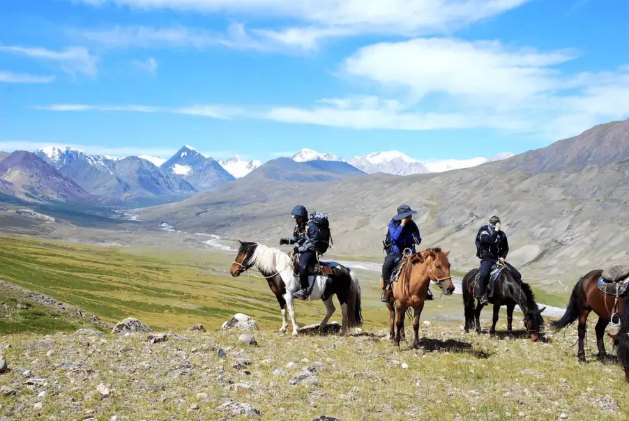 Riders journey through mountain trails in Altai Tavan Bogd